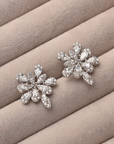 Arete flor brillante