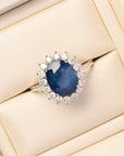 Oval Sapphire and Diamond Halo Ring