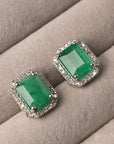 LAR113 - Emerald and Diamond Halo White Gold Studs