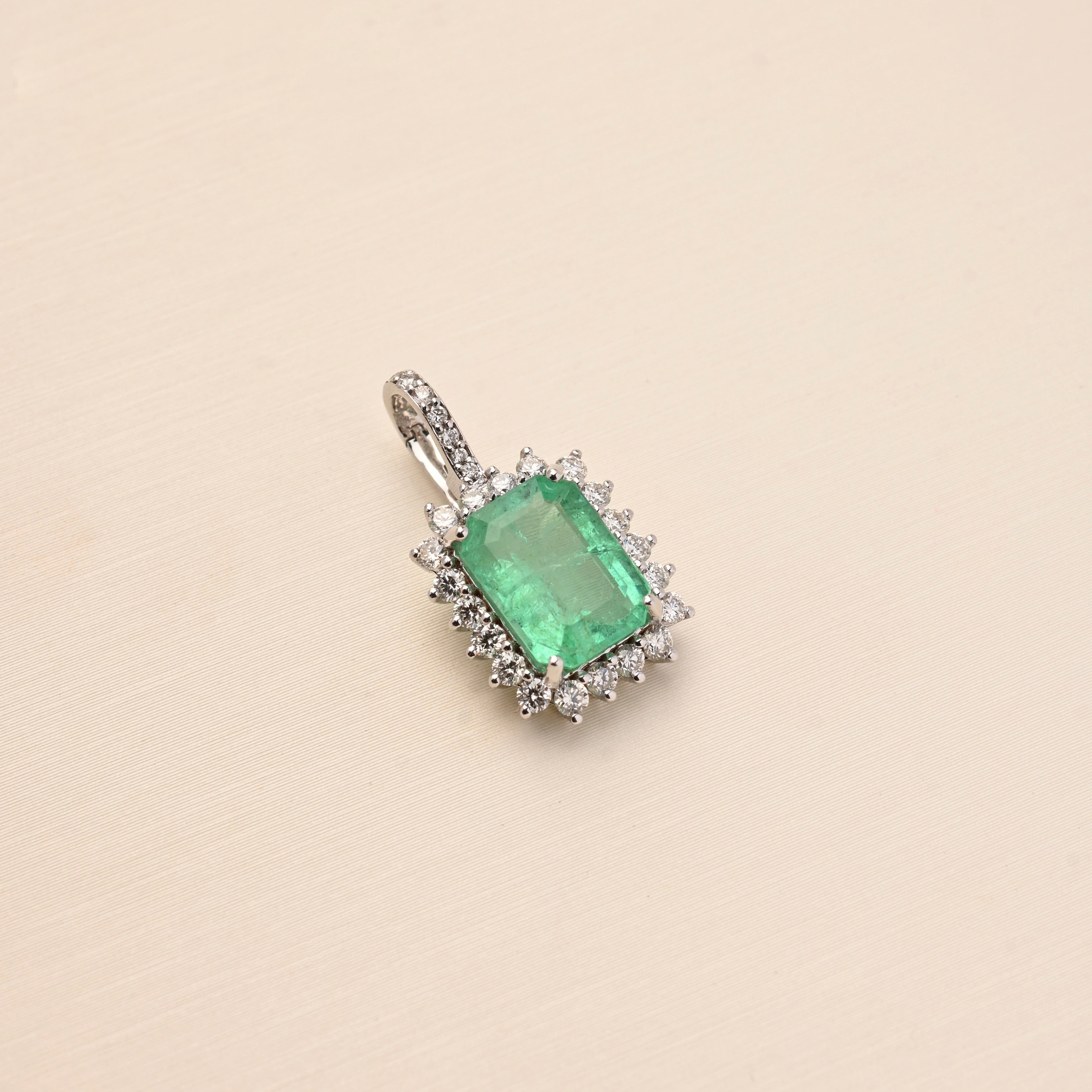 Emerald and Diamond Halo Pendant