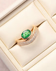 Bezel-Set oval Emerald and Diamond Ring