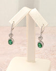 Oval Emerald Diamond Halo Dangle Earrings