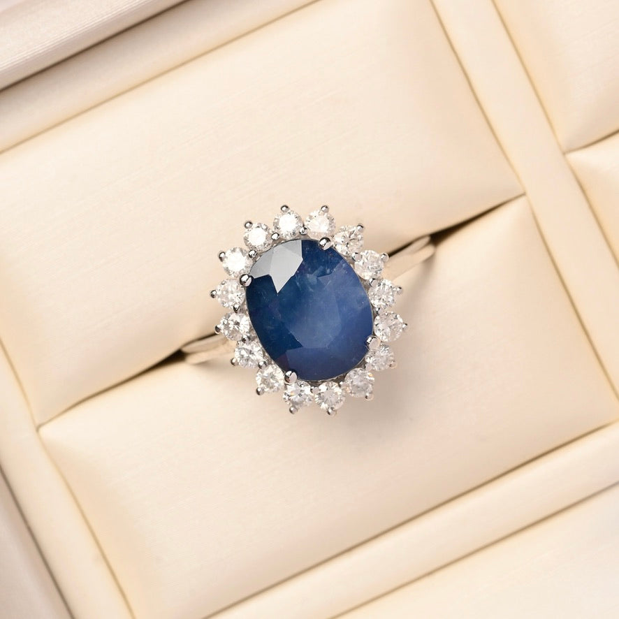 Oval Sapphire and Diamond Halo Ring