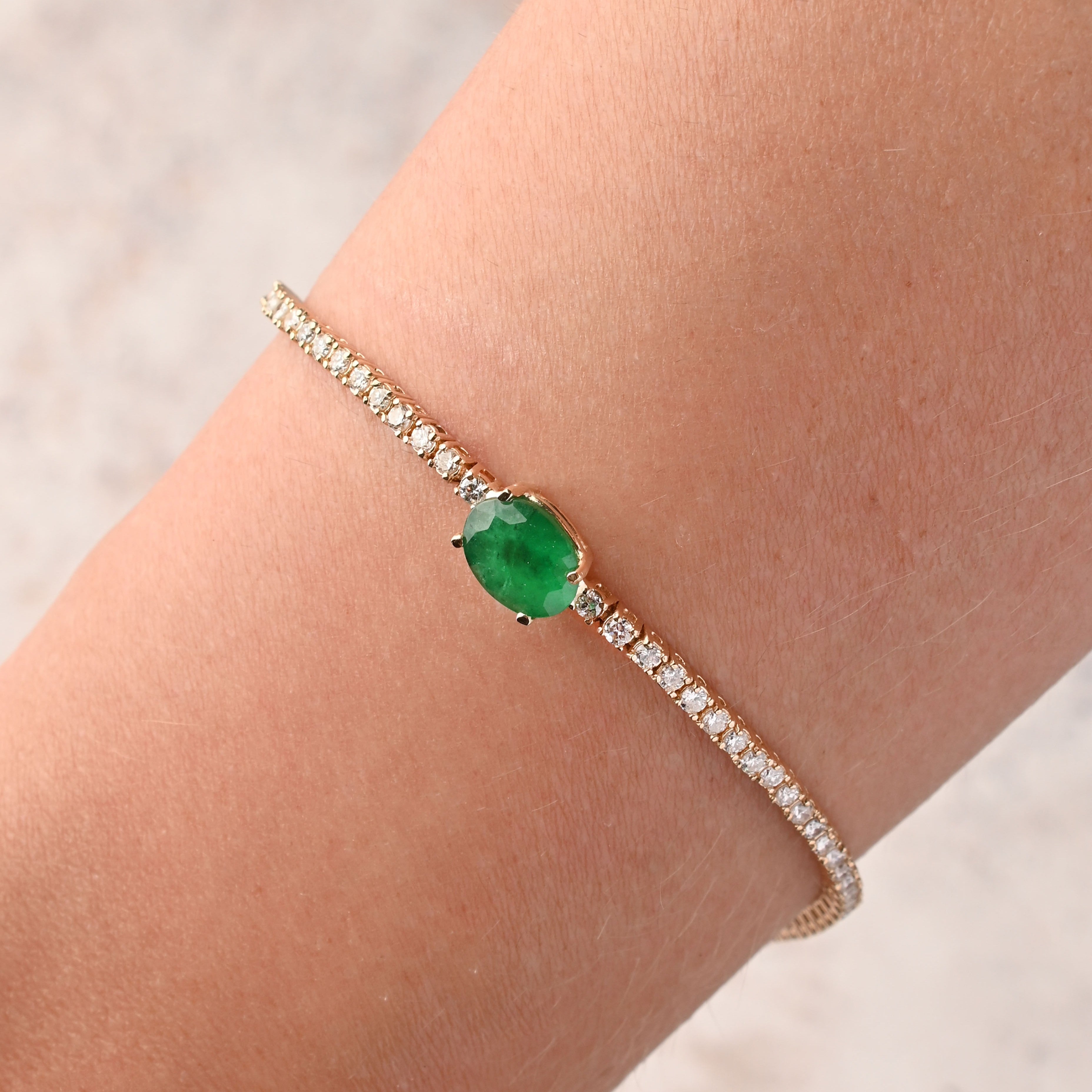 Emerald Yellow Gold Tennis Bracelet