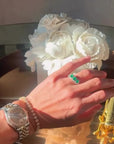 Three-stone Oval Emerald Ring