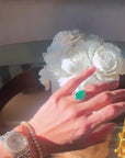 Pear Shaped Emerald Halo Ring